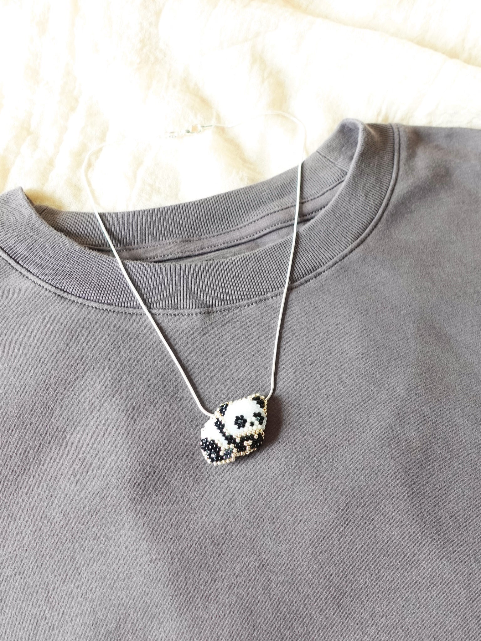 Small Panda Loaf Necklace Shirt Left