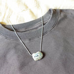 Small Raccoon Loaf Necklace Shirt Left