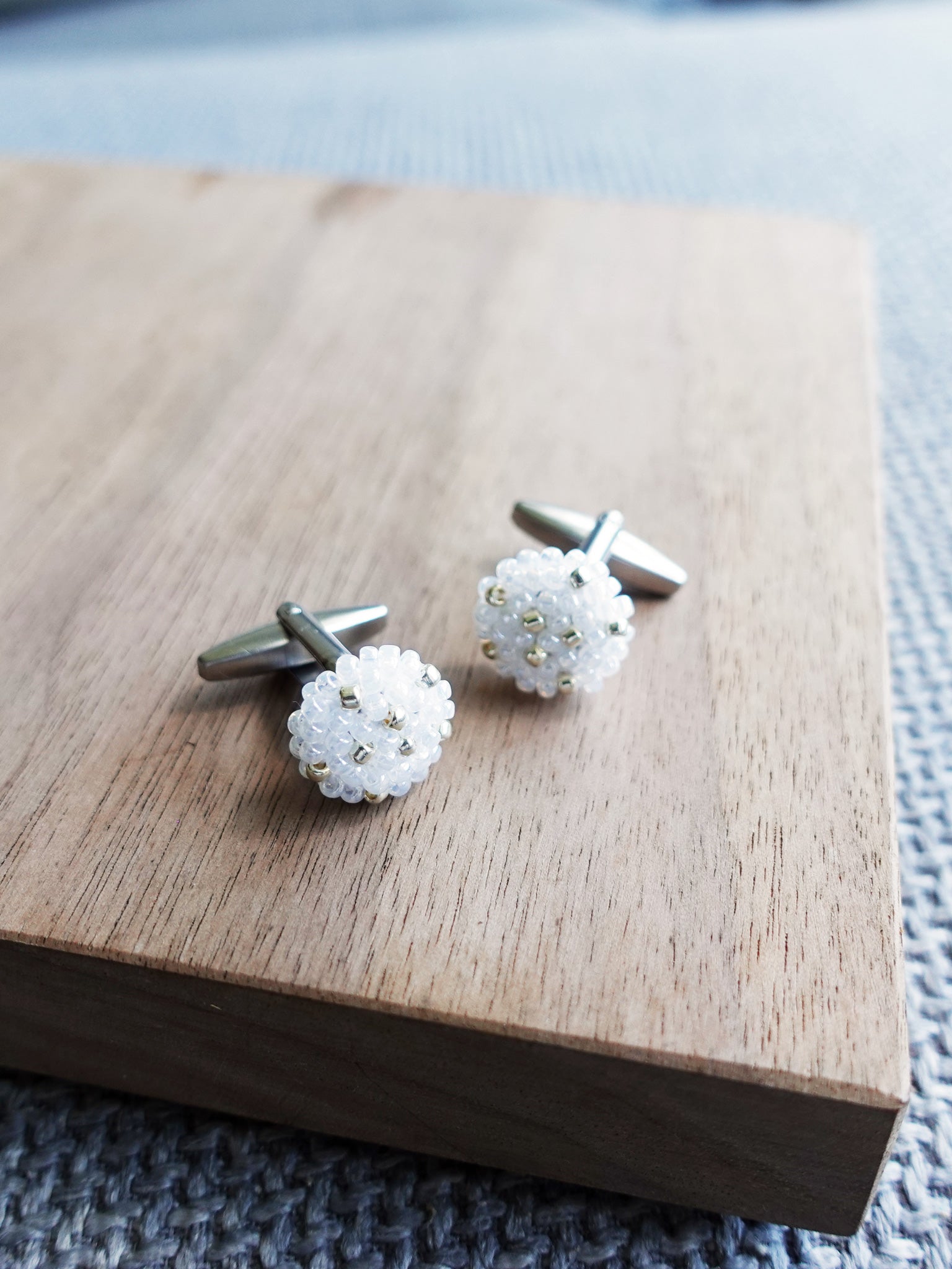 Star Dust Delica Cufflink in White Display