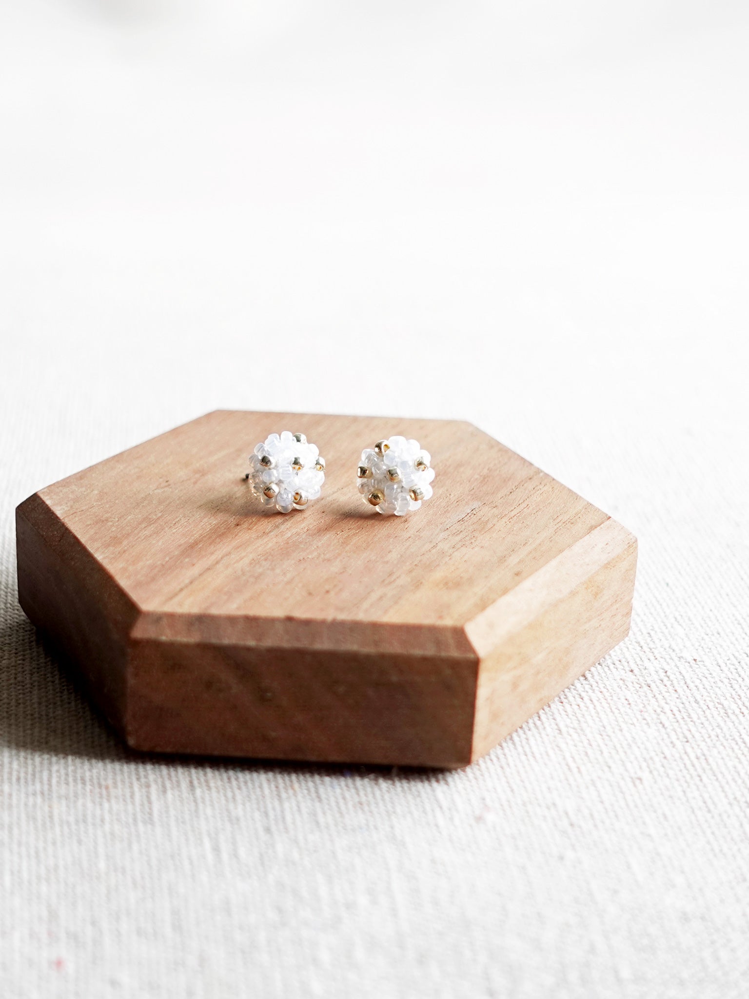 Star Dust Petite Stud Earrings in White Display Front