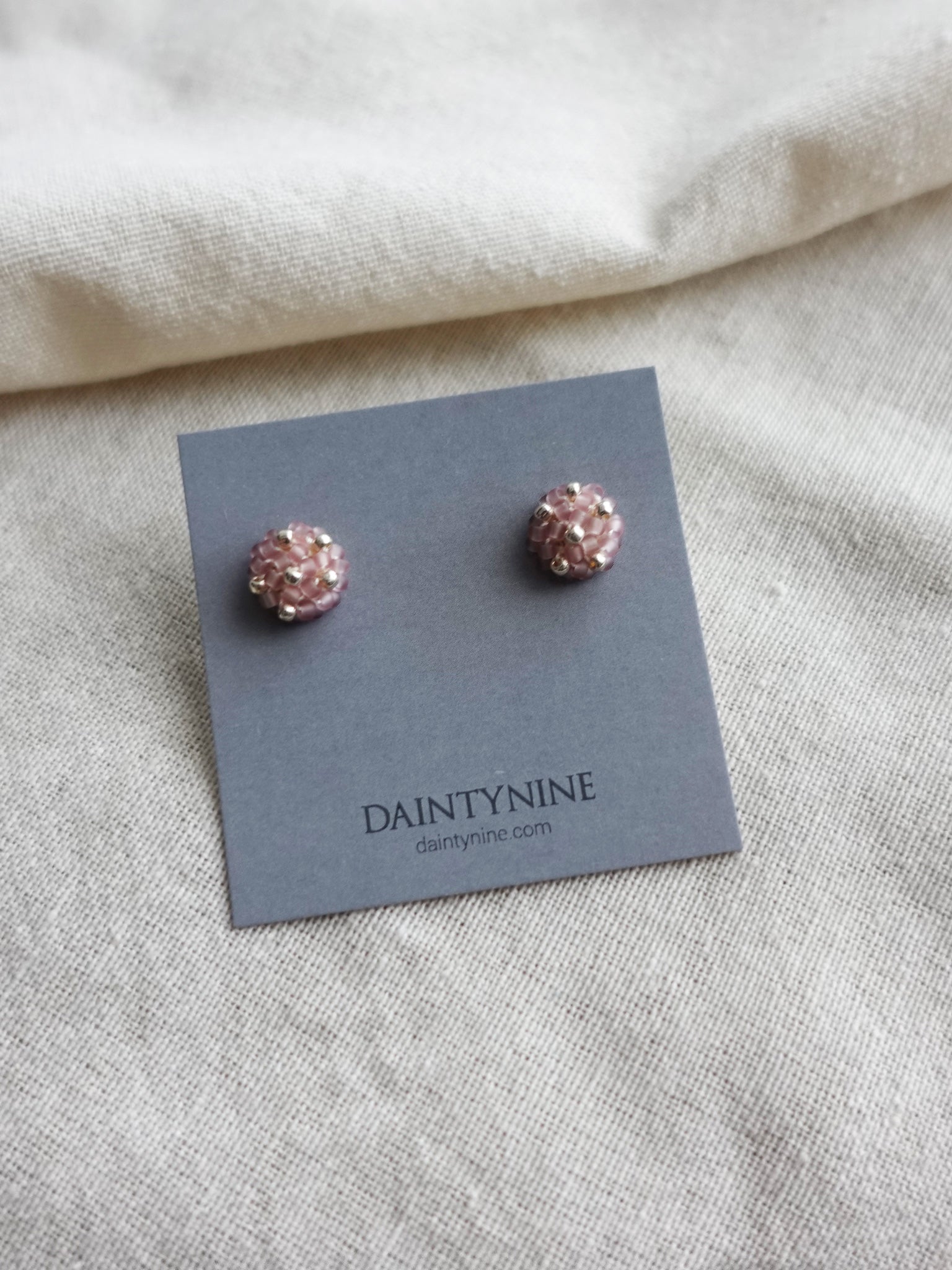 Star Dust Petite Stud Earrings in Mauve Purple Card