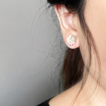 Trio Stud Earrings in Pale Pink Model