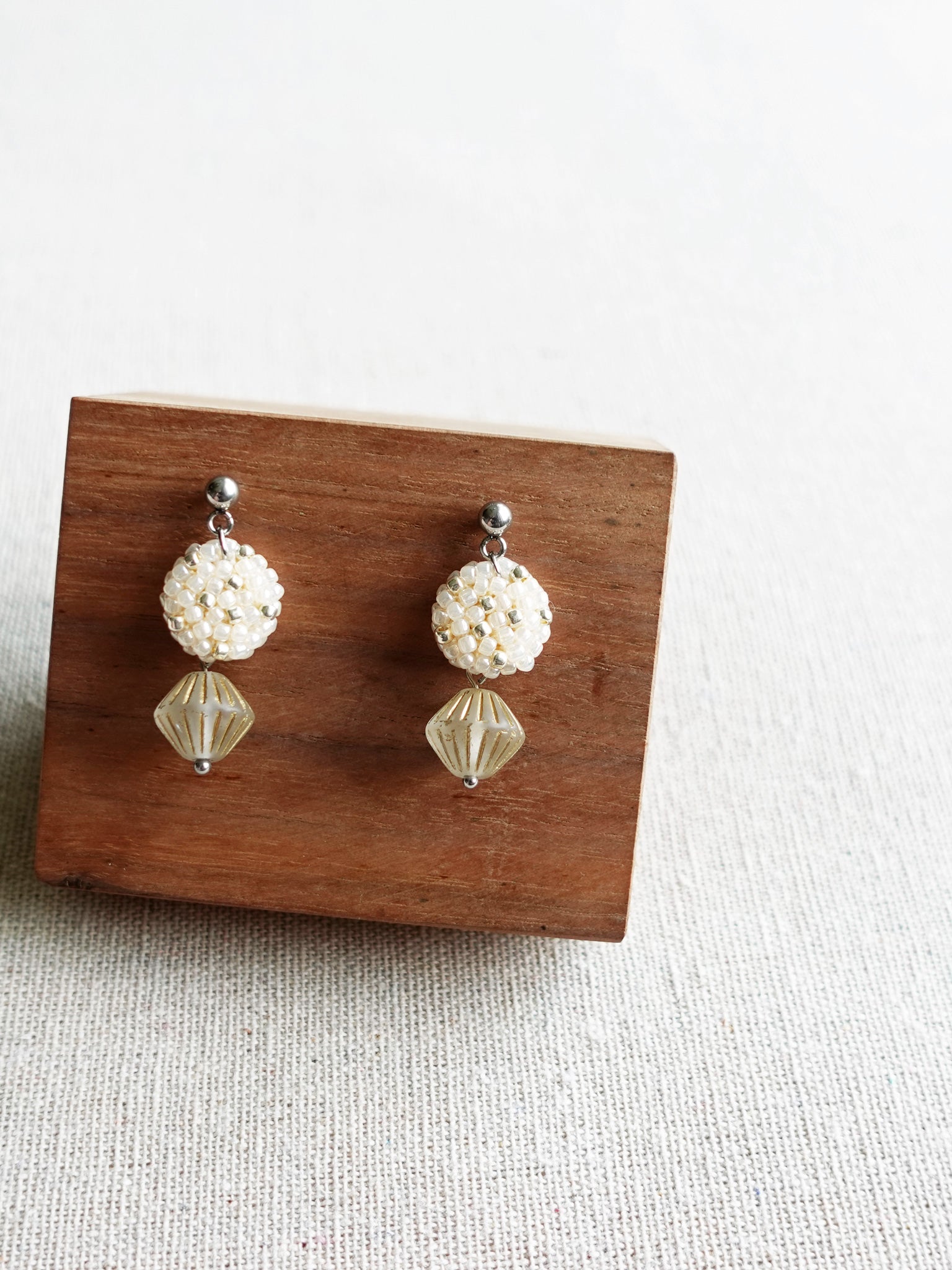 Vera Star Dust Earrings in Ivory Display Front