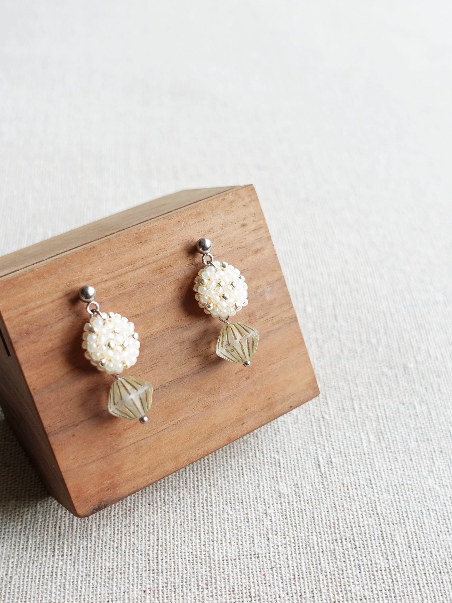 Vera Star Dust Earrings in Ivory Display Side