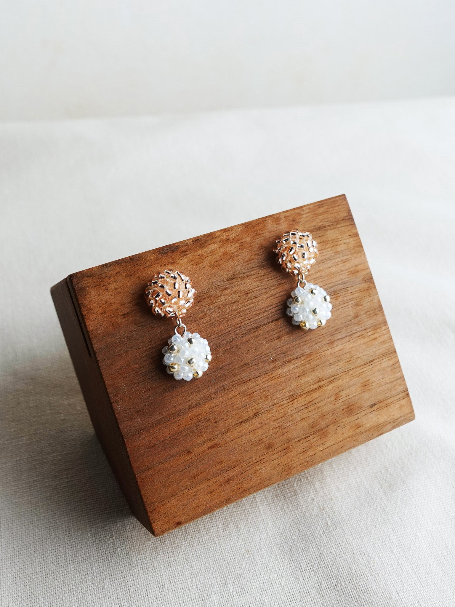 Abigail Earrings in Champagne Pink Display Left