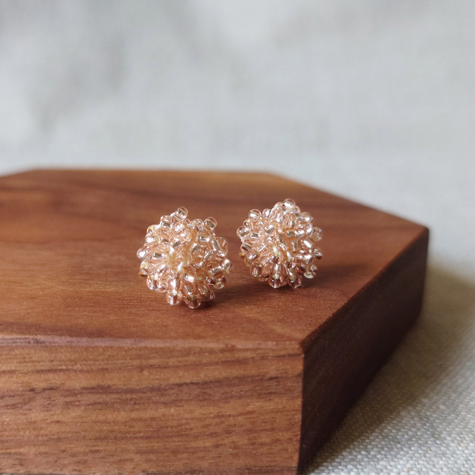 Ariel Stud Earrings in Champagne Pink Front 2
