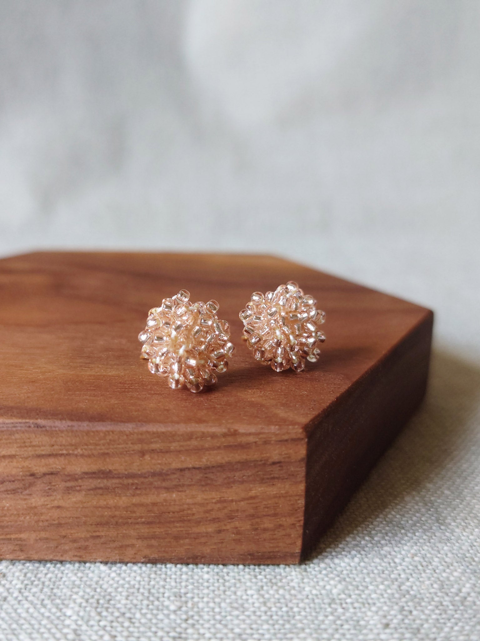 Ariel Stud Earrings in Champagne Pink Front 2