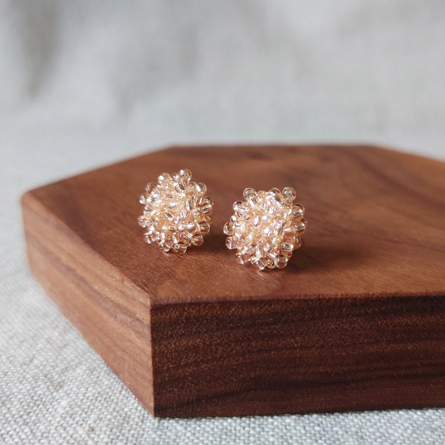 Ariel Stud Earrings in Champagne Pink Front