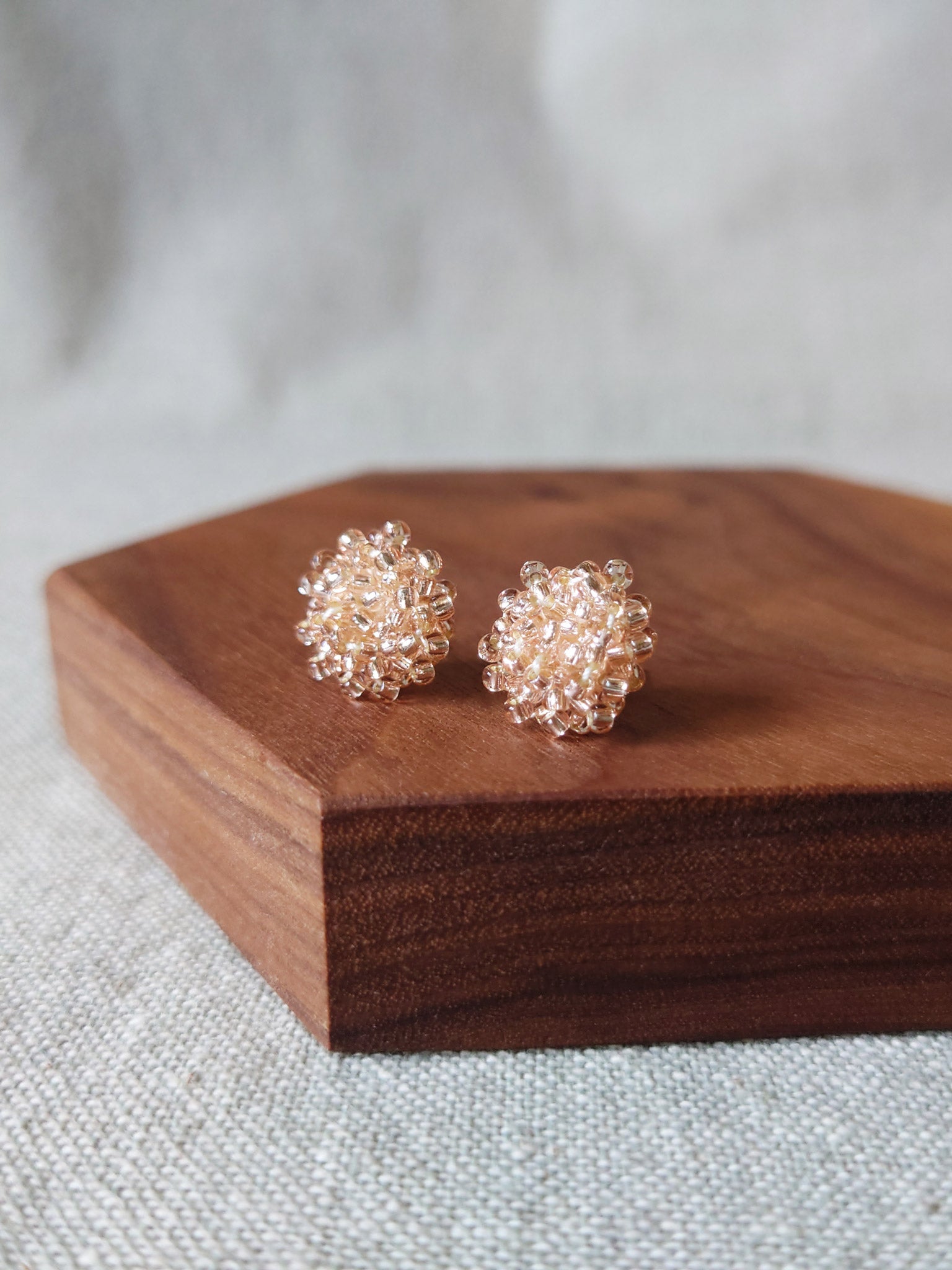 Ariel Stud Earrings in Champagne Pink Front