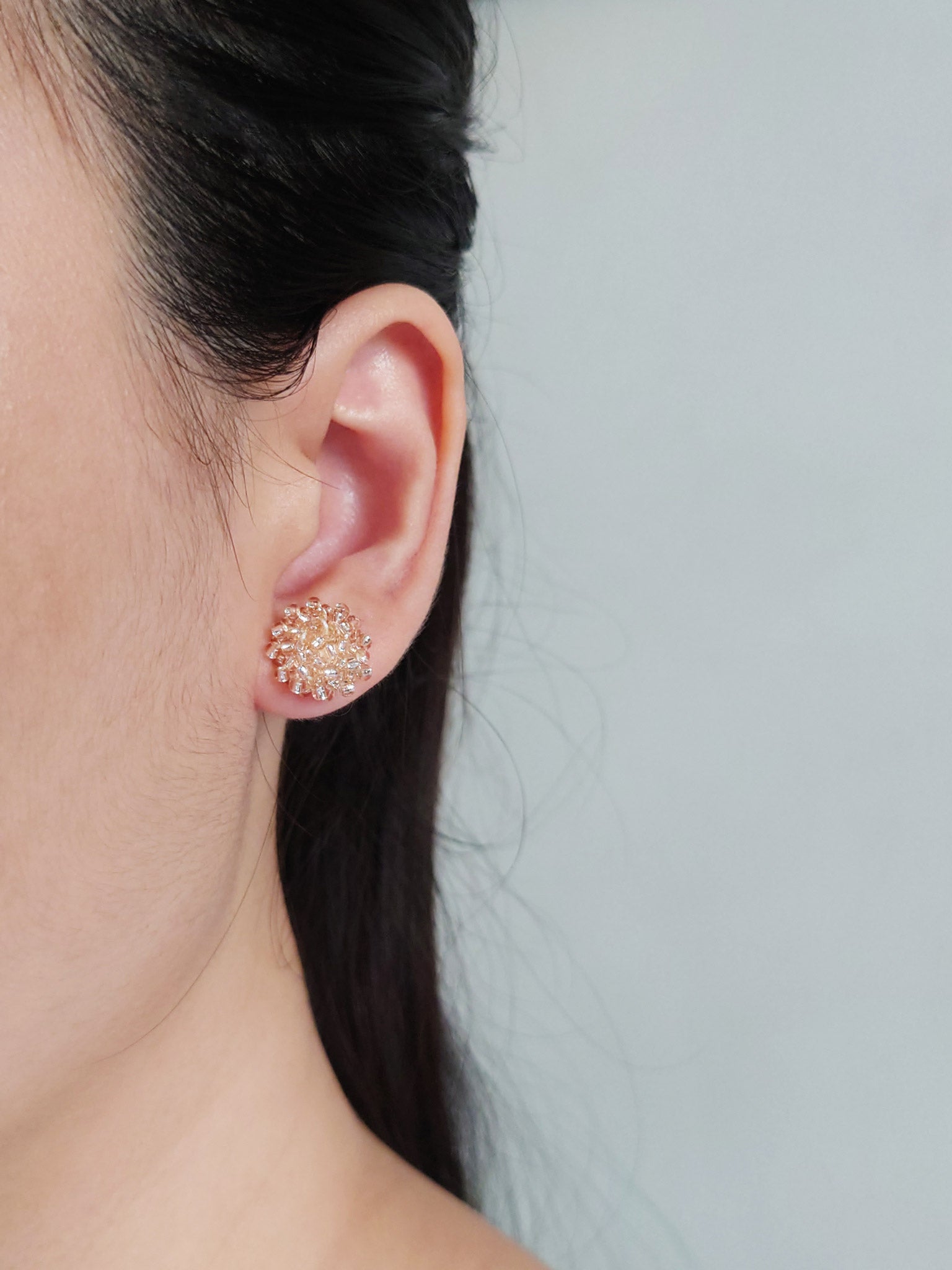 Ariel Stud Earrings in Champagne Pink Model