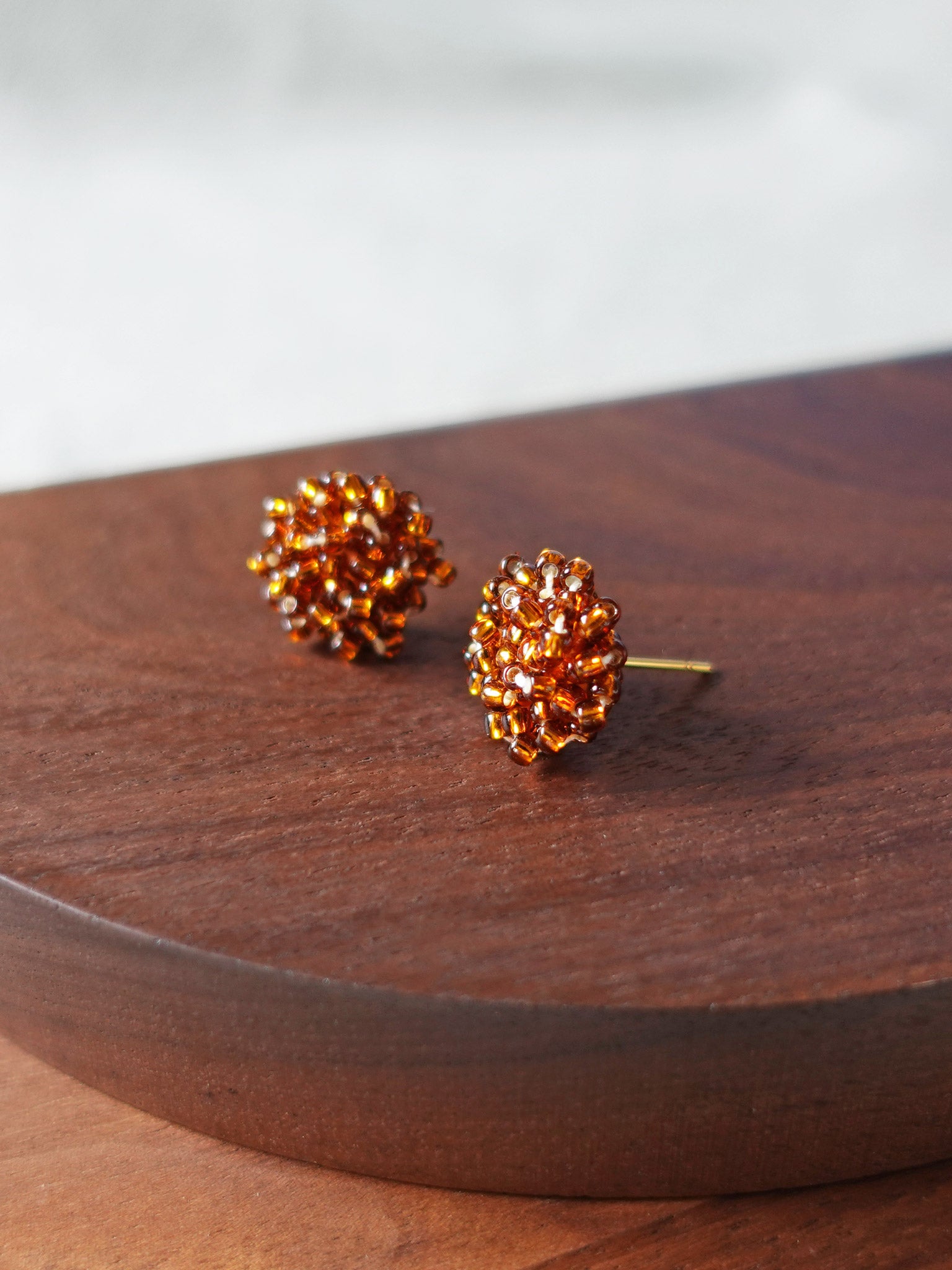 Ariel Stud Earrings in Dark Amber Display Side
