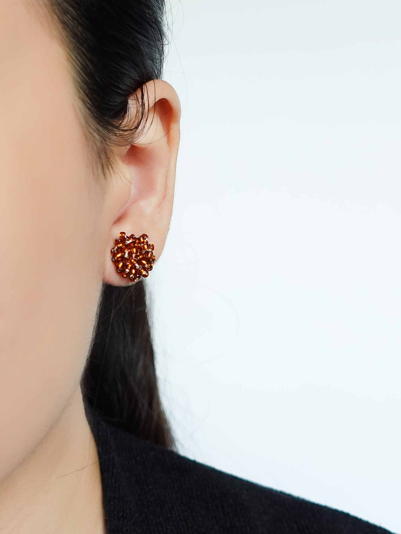 Ariel Stud Earrings in Dark Amber Model