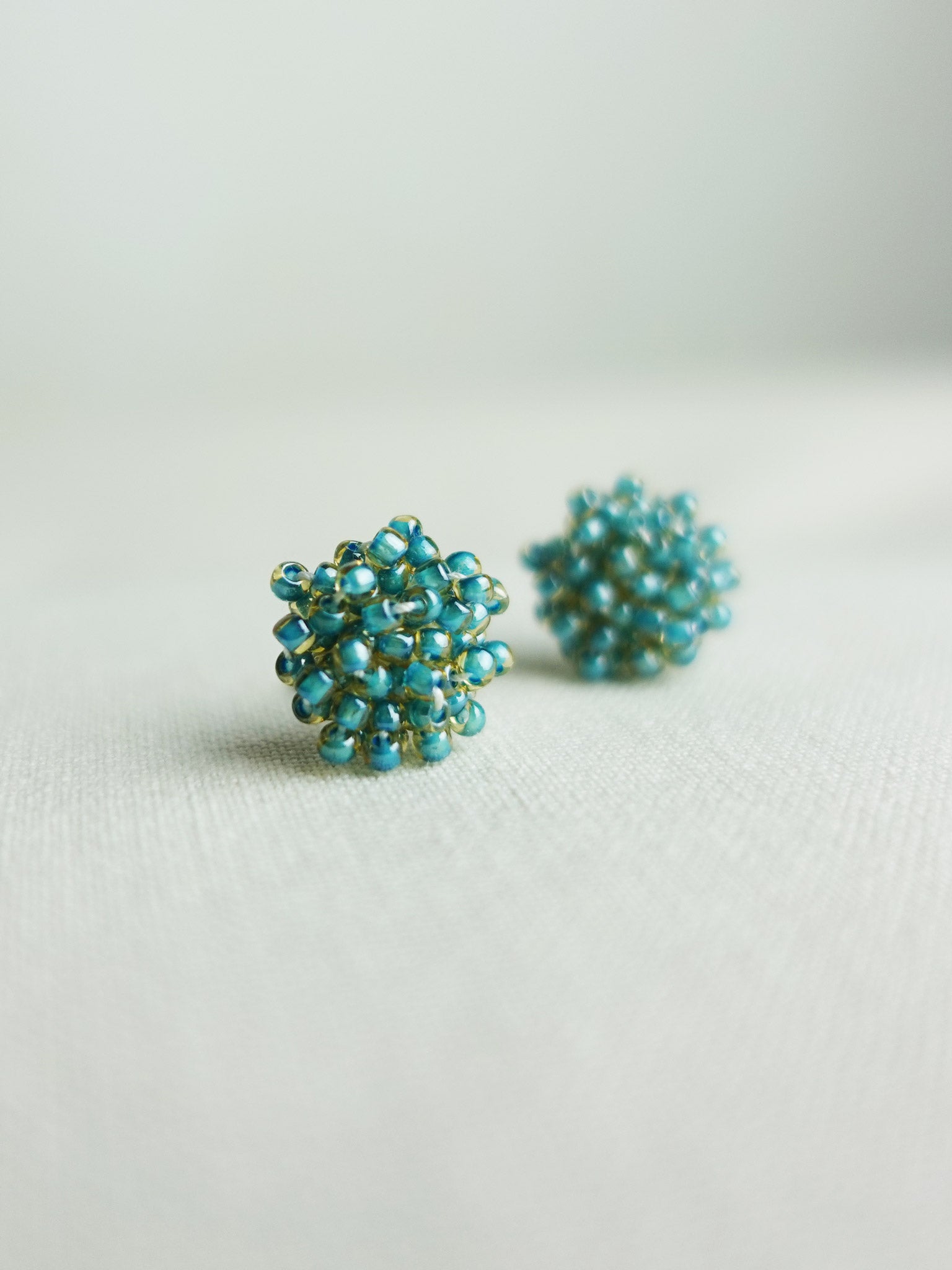 Ariel Stud Earrings in Ocean Green Left