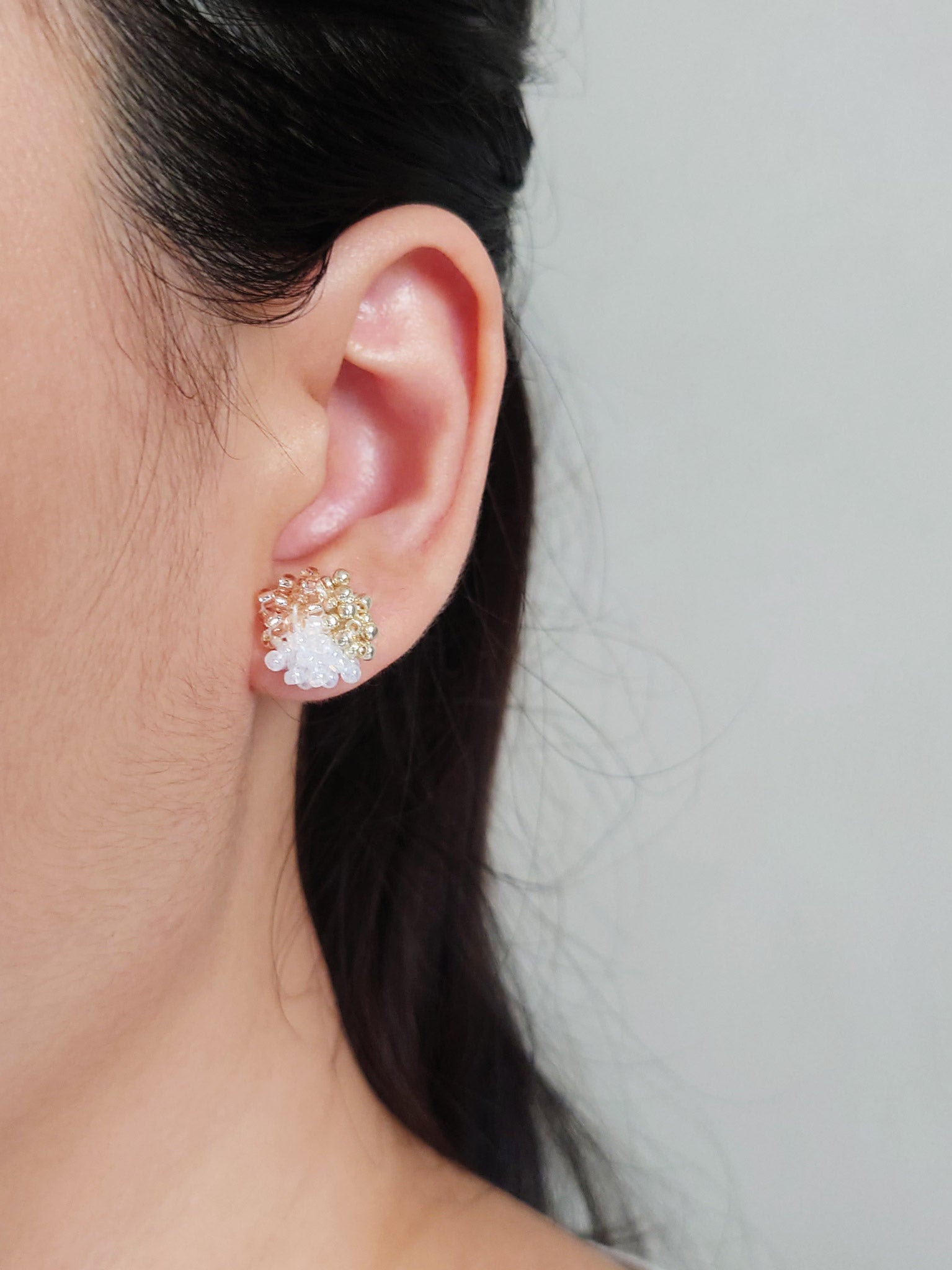 Ariel Trio Stud Earrings in Champagne Pink Model