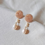 Calypso Dangle Earrings in Champagne Pink Front 1