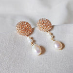 Calypso Dangle Earrings in Champagne Pink Left 2