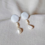 Calypso Dangle Earrings in White Left