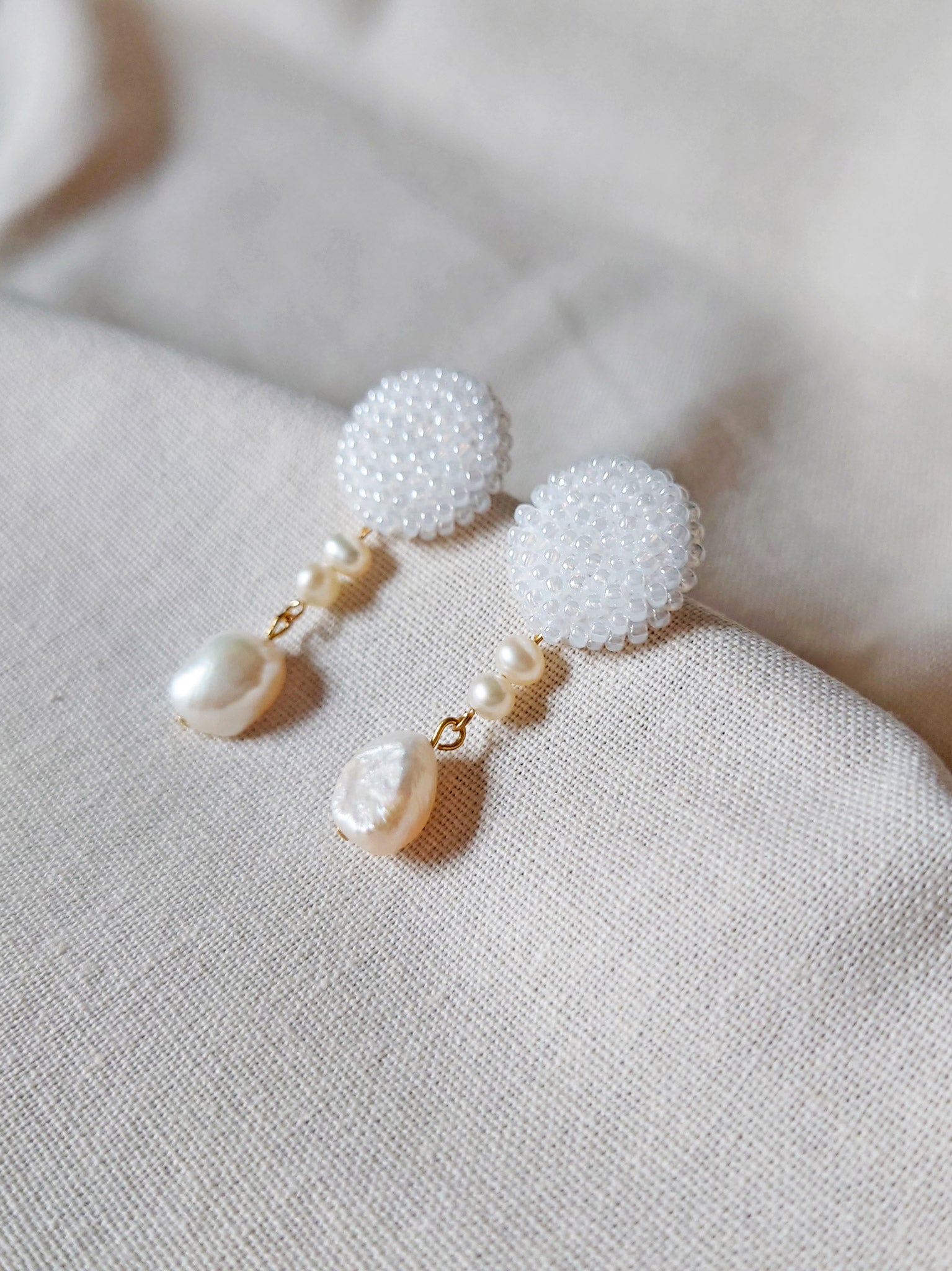 Calypso Dangle Earrings in White Right