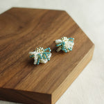 Camellia Bicolor Stud Earrings in Ocean Green Display Left