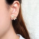 Camellia Bicolor Stud Earrings in Strawberry Red Model