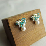 Camellia Mariota Bicolor Earrings in Ocean Green Display