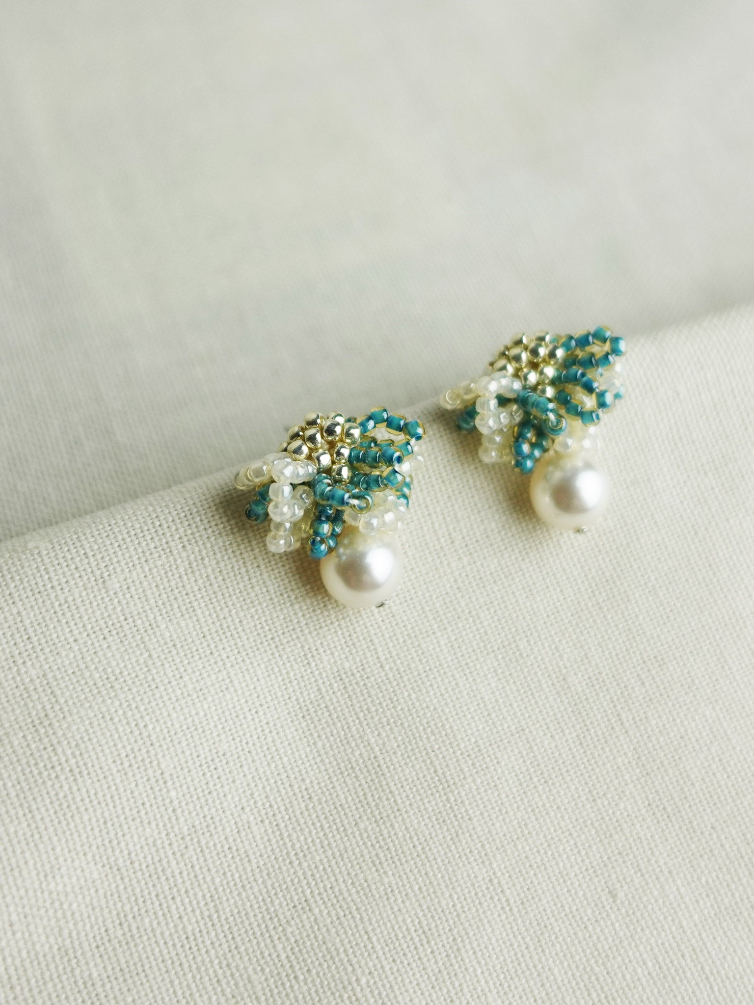Camellia Mariota Bicolor Earrings in Ocean Green Left
