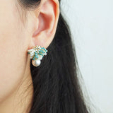 Camellia Mariota Bicolor Earrings in Ocean Green Model