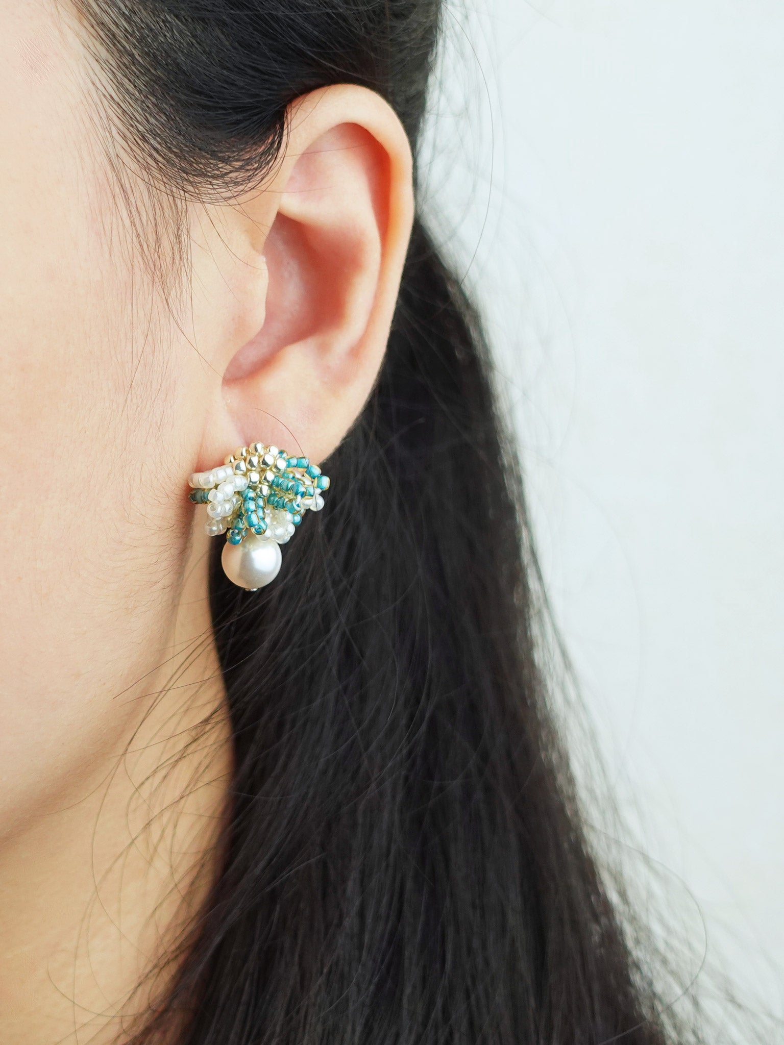 Camellia Mariota Bicolor Earrings in Ocean Green Model