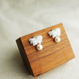 Camellia Mariota Earrings in White Display Left