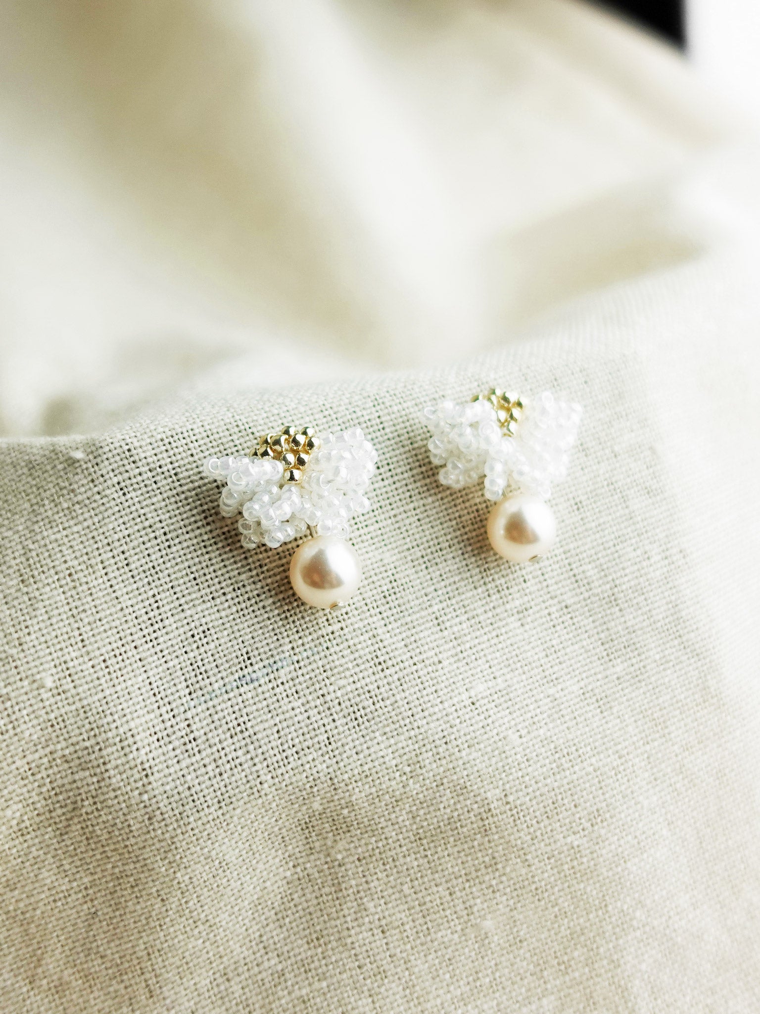 Camellia Mariota Earrings in White Left