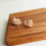 Camellia Stud Earrings in Champagne Pink Display