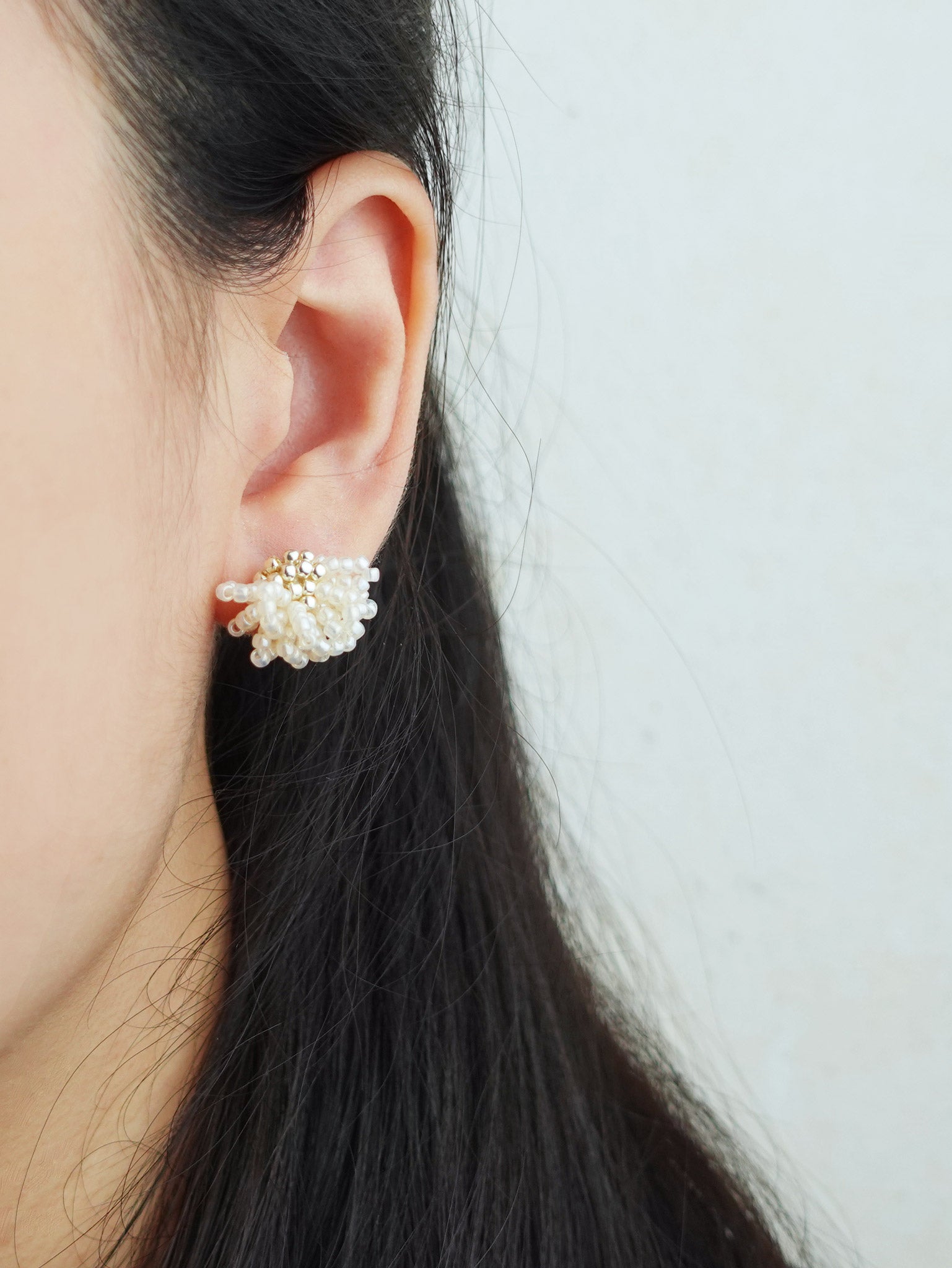 Camellia Stud Earrings in Ivory Model