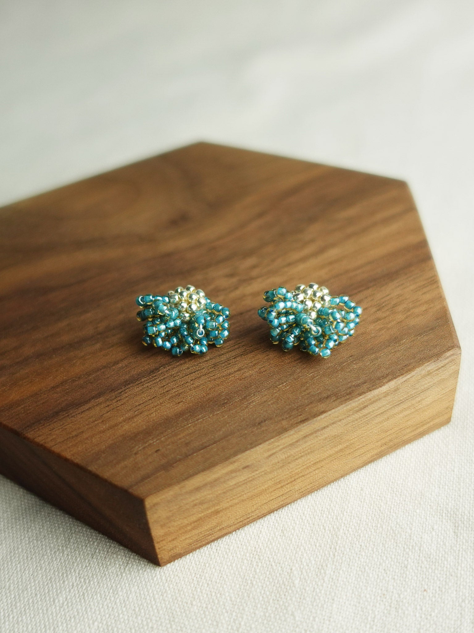 Camellia Stud Earrings in Ocean Green Display Front