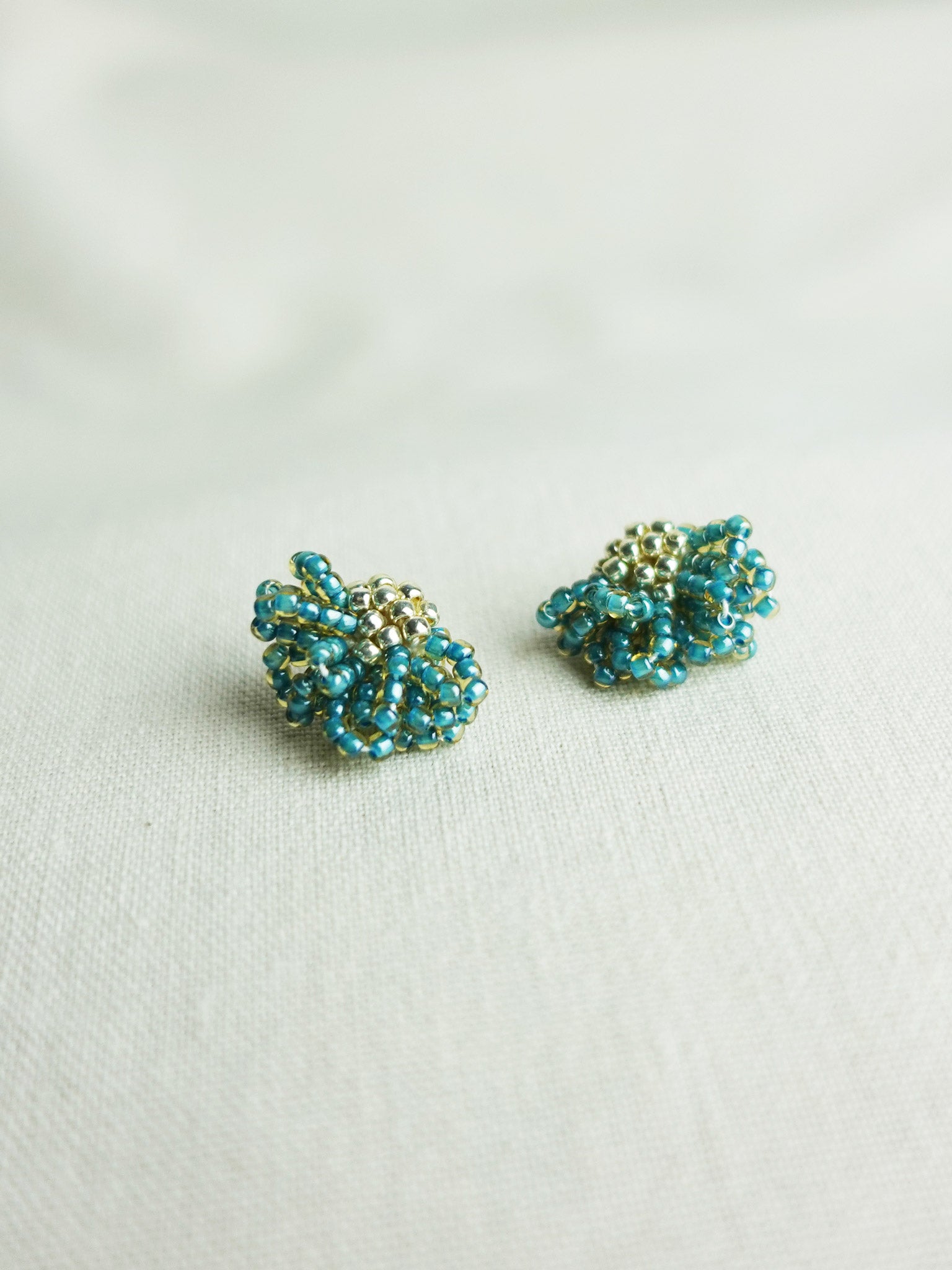 Camellia Stud Earrings in Ocean Green Front