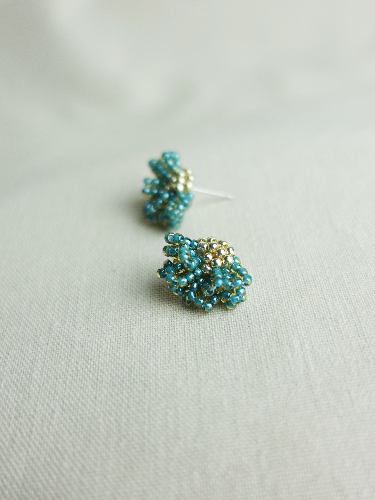 Camellia Stud Earrings in Ocean Green Right