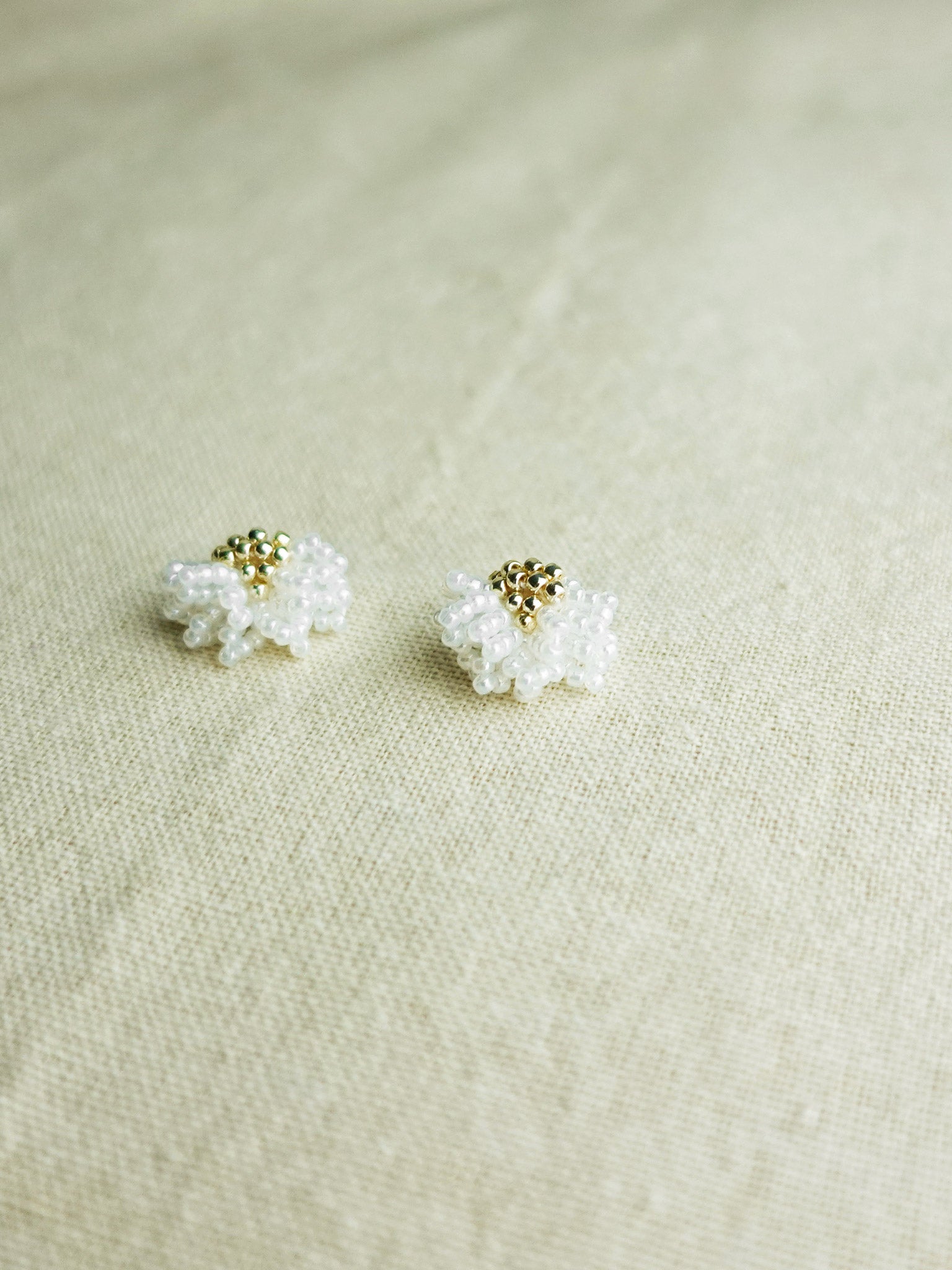 Camellia Stud Earrings in White Front