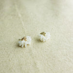 Camellia Stud Earrings in White Left