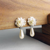 Diana Teardrop Mariota Clip-on Earrings in Ivory Dsplay Left
