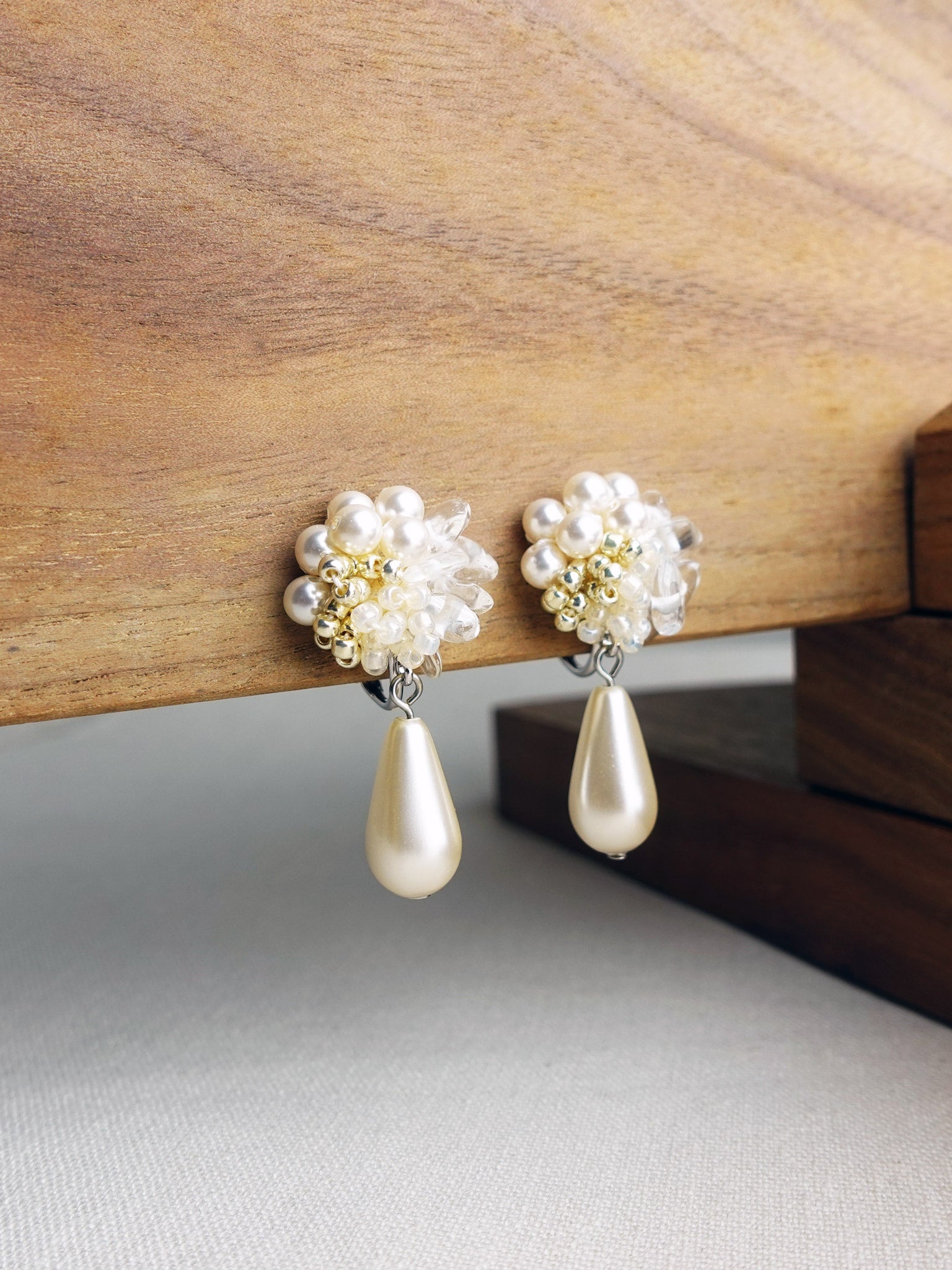 Diana Teardrop Mariota Clip-on Earrings in Ivory Dsplay Left