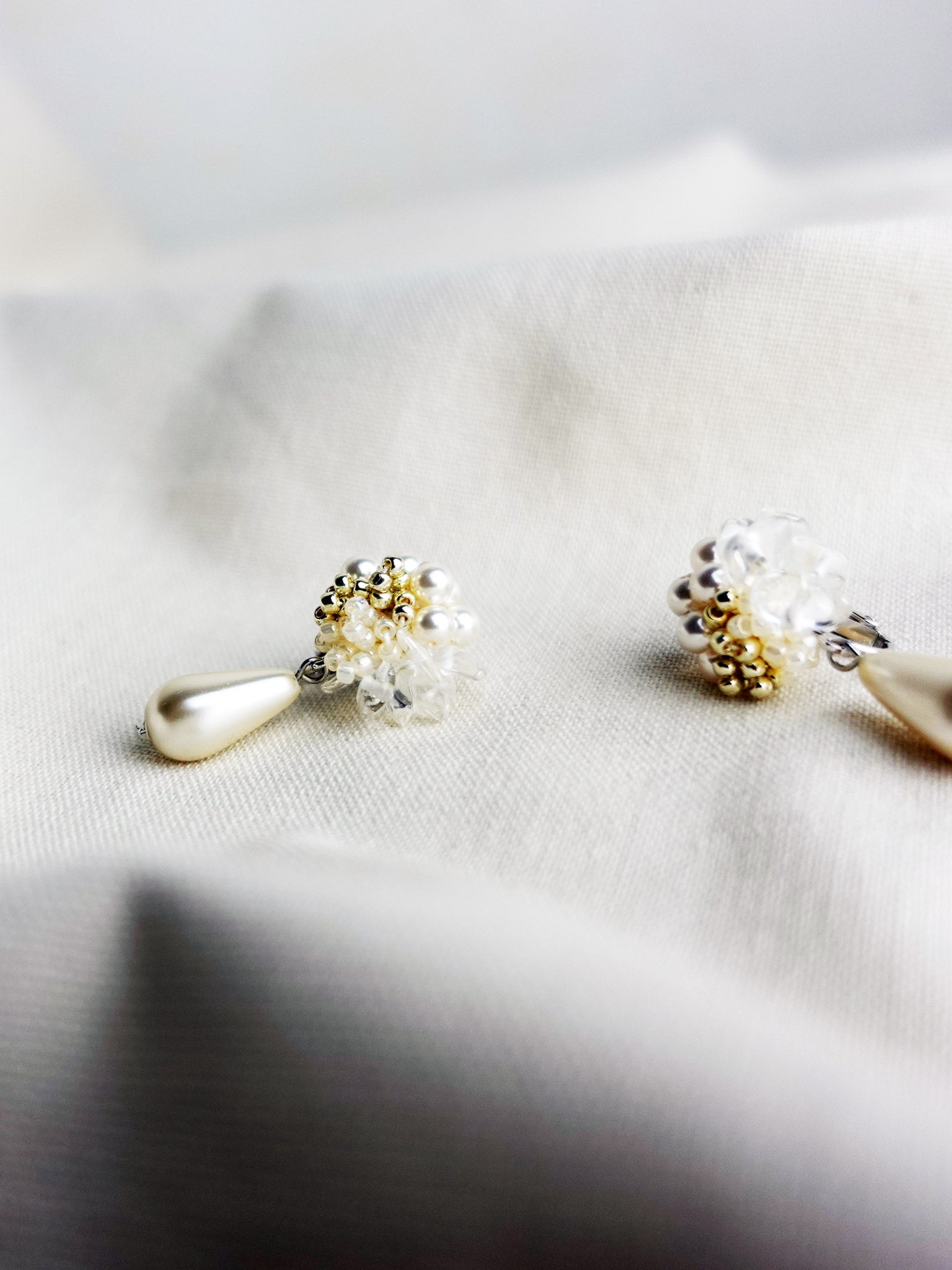 Diana Teardrop Mariota Clip-on Earrings in Ivory Left