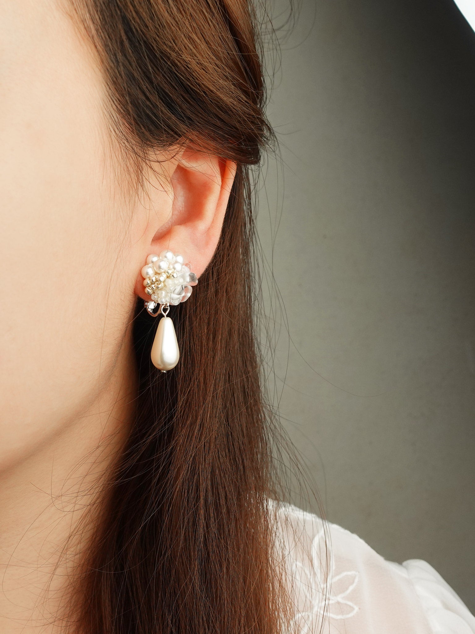 Diana Teardrop Mariota Clip-on Earrings in Ivory Model