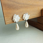 Diana Teardrop Mariota Clip-on Earrings in White Left 2