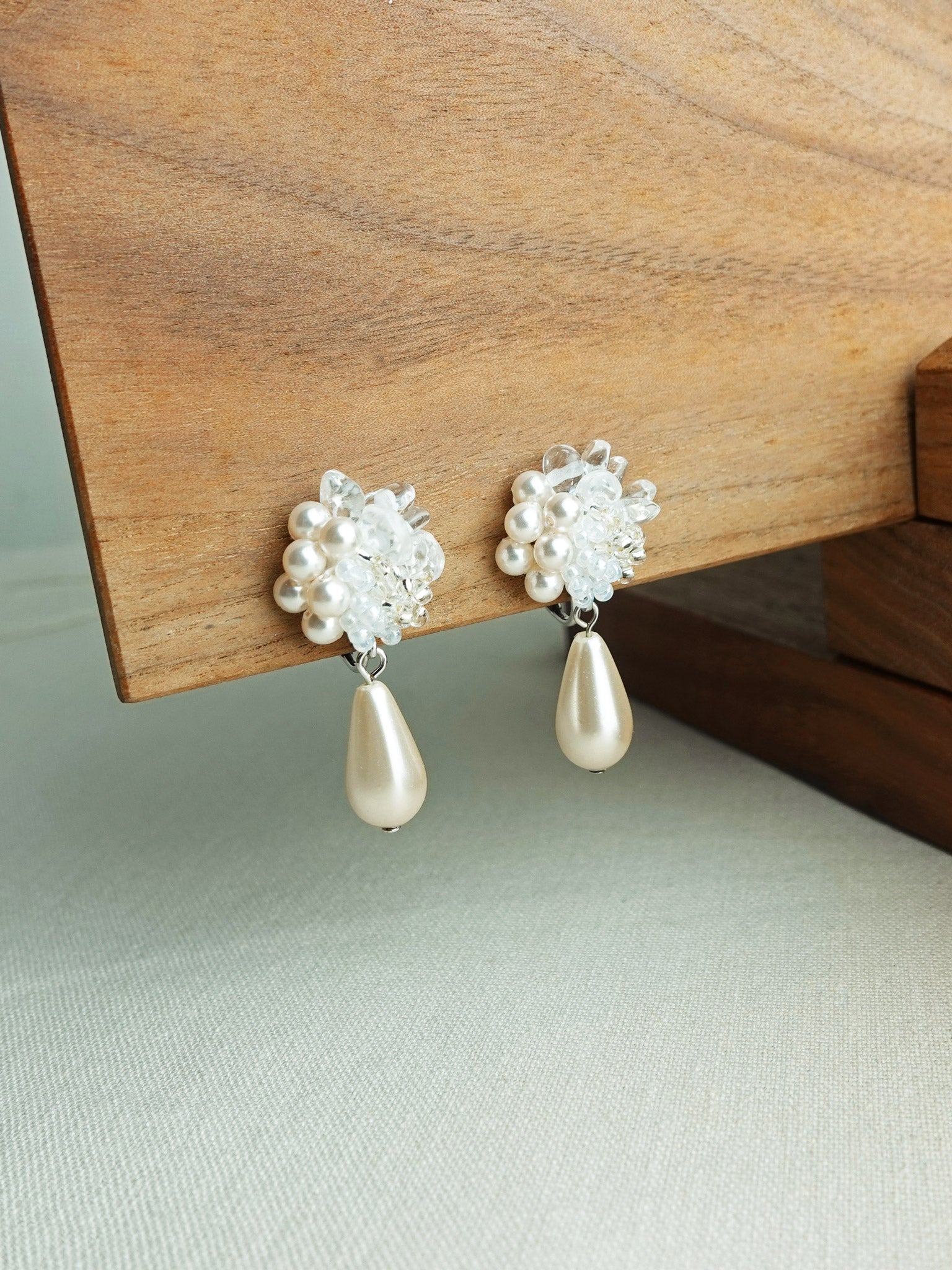 Diana Teardrop Mariota Clip-on Earrings in White Left 2