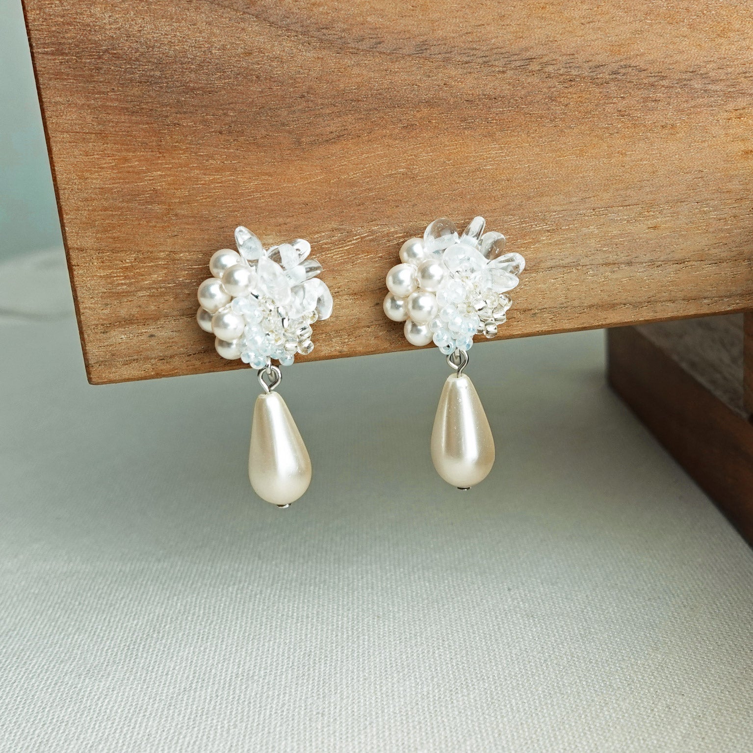 Diana Teardrop Mariota Clip-on Earrings in White Left