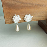 Diana Teardrop Mariota Clip-on Earrings in White Left