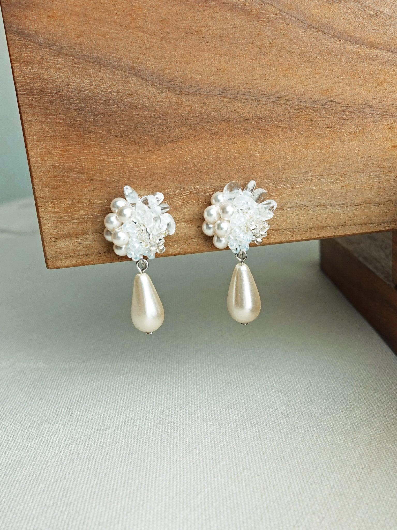 Diana Teardrop Mariota Clip-on Earrings in White Left