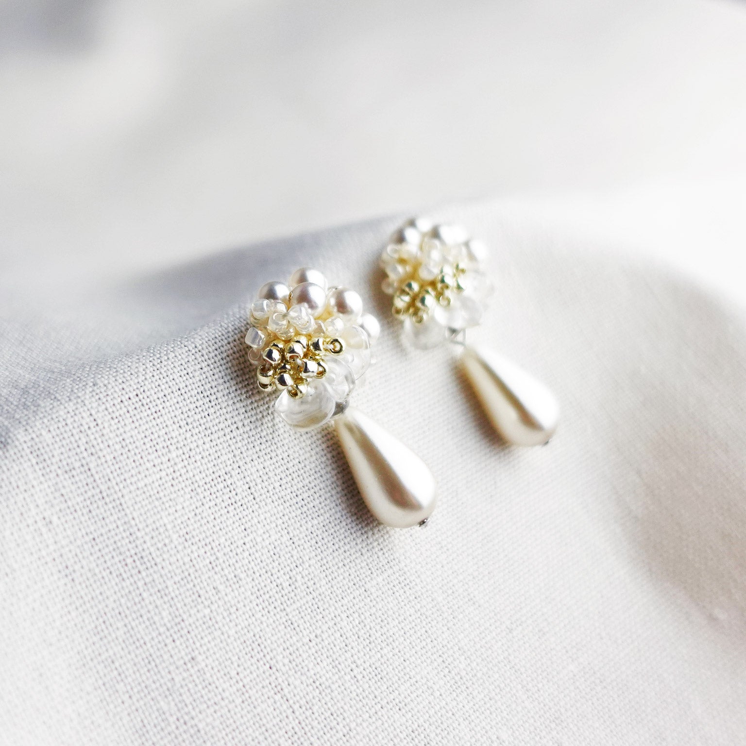 Diana Teardrop Mariota Earrings in Ivory Left