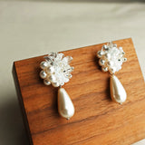 Diana Teardrop Mariota Earrings in White Left 2