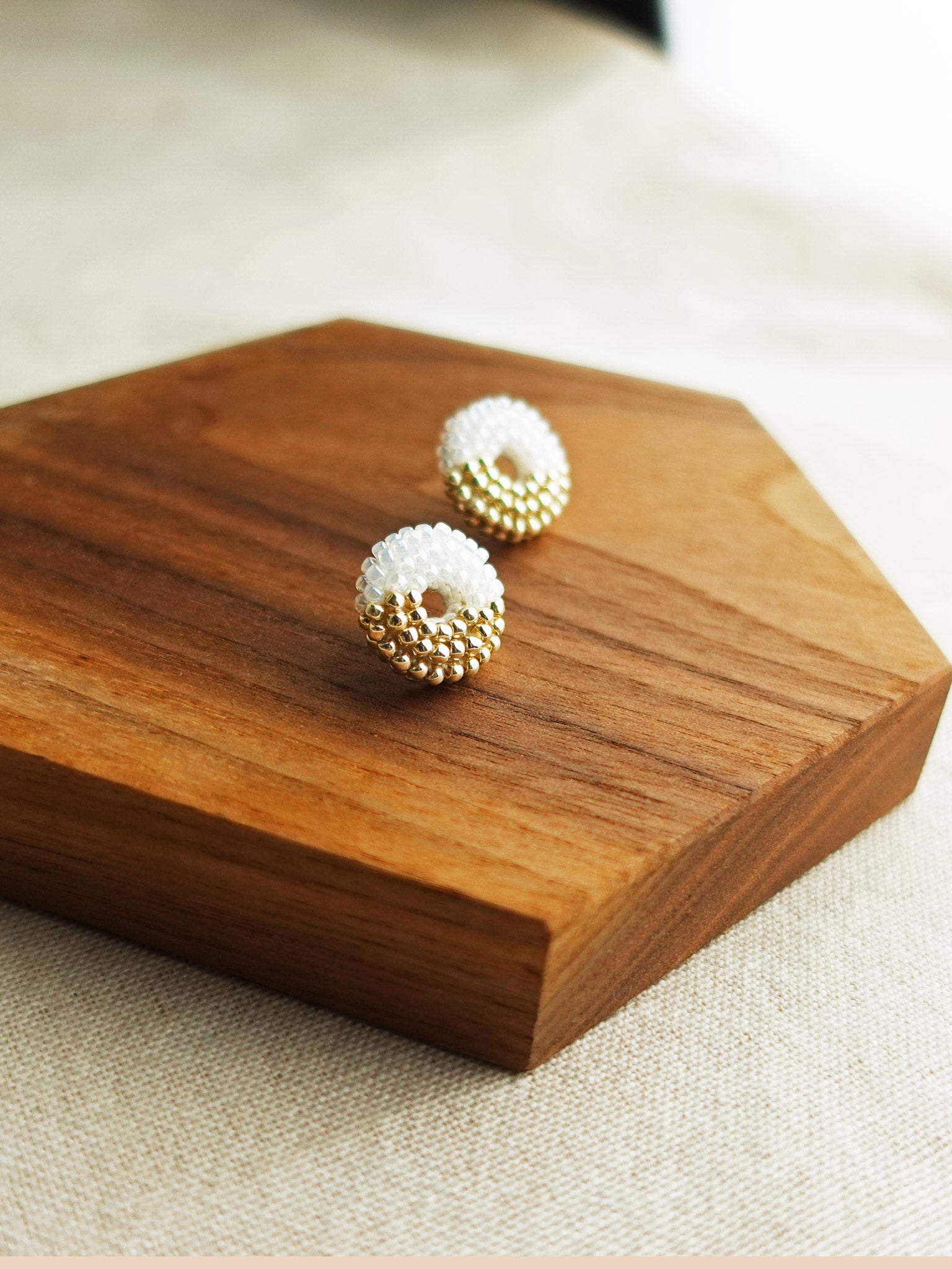Donut Dip Stud Earrings in White Display Left