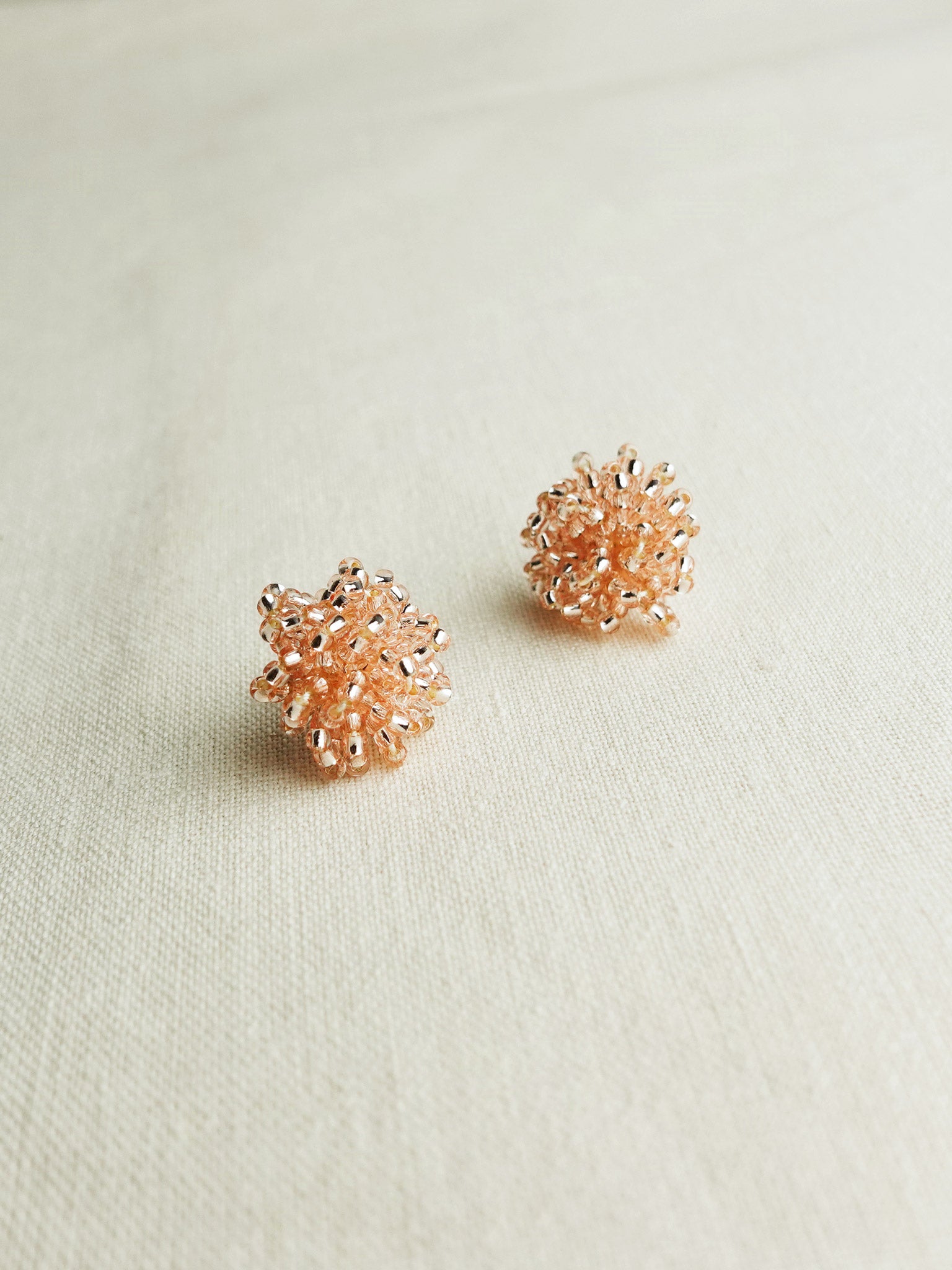 Fluffy Earrings in Champagne Pink Side